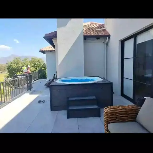 Hot tub on a modern outdoor patio terrace